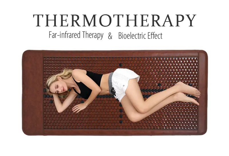 Woman lying on a far-infrared tourmaline heating mat for bioelectric therapy and chronic pain relief.